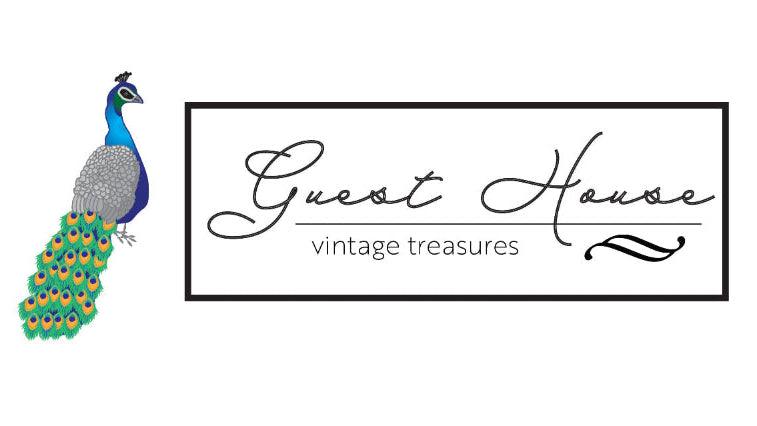 Peacock illustration next to 'Guest House Vintage Treasures' logo on a white background